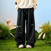 Nuthink American fashion brand embroidered letter hanging sense sanitary pants with velvet pants wide leg pants for men, spring 2026
