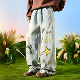 Nuthink American retro washed distressed puppy wide leg jeans with drape and plush pants for men in spring 2026