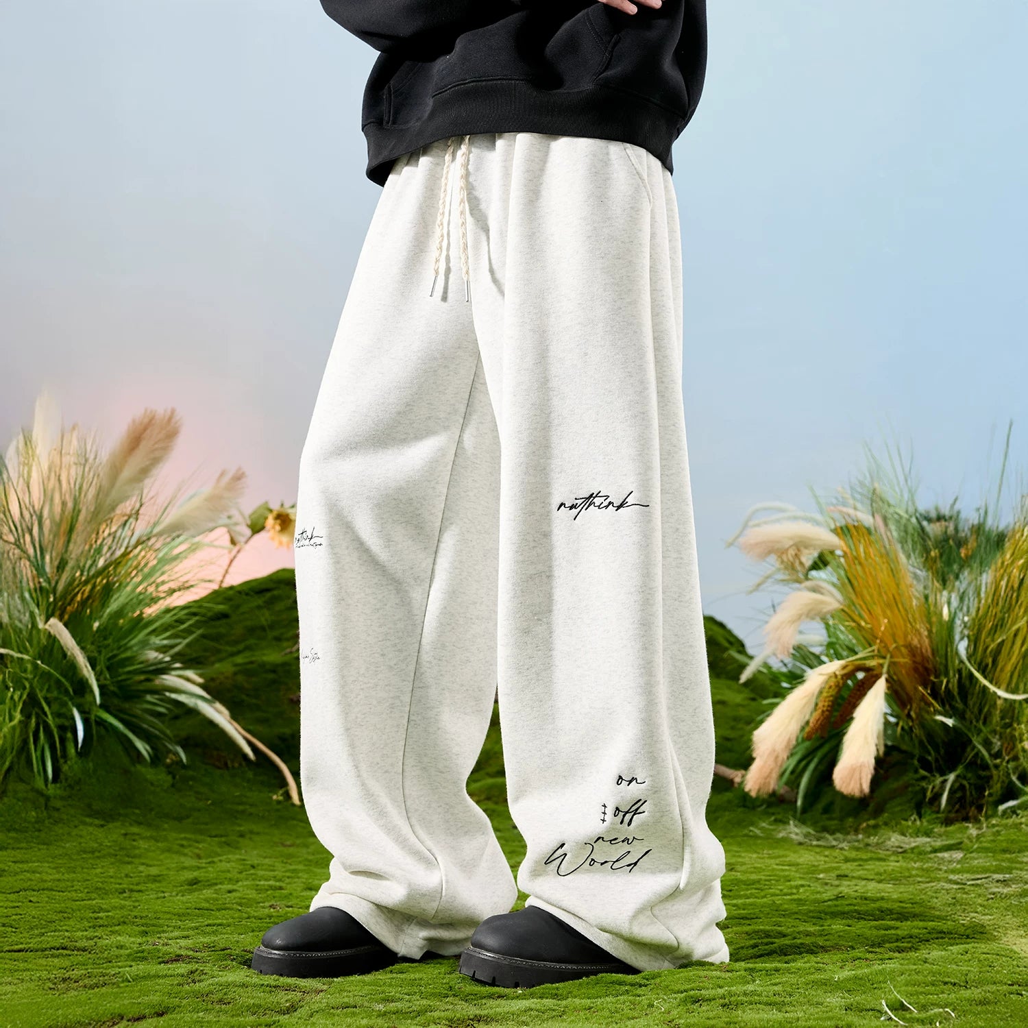 Nuthink American fashion brand embroidered letter hanging sense sanitary pants with velvet pants wide leg pants for men, spring 2026